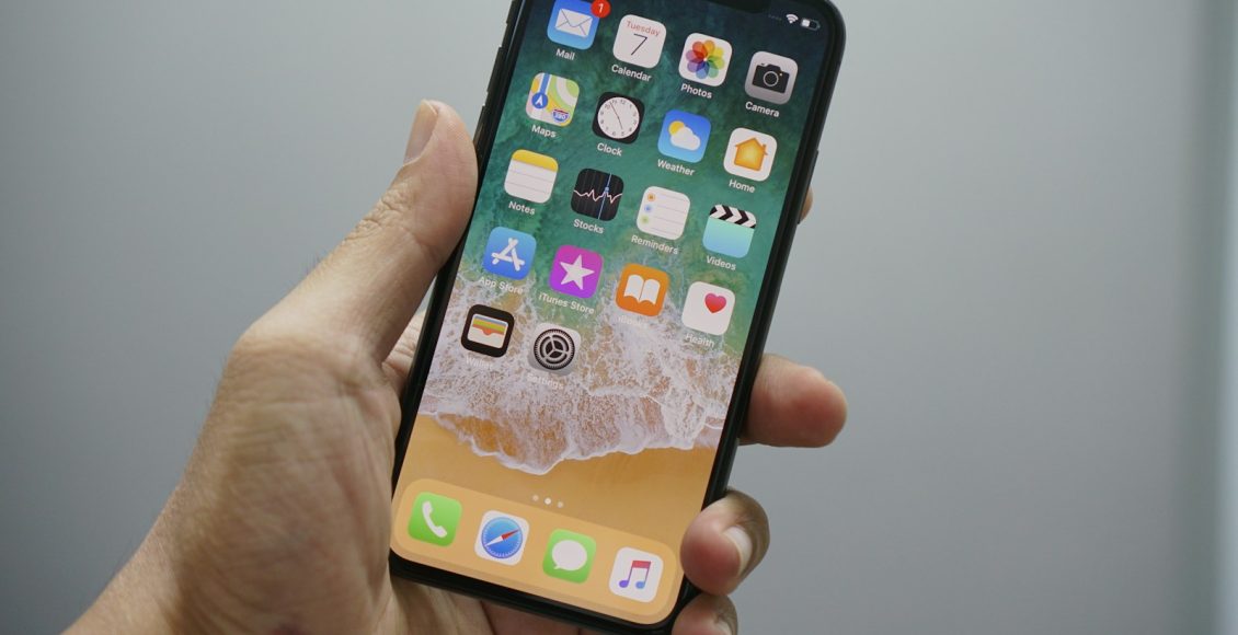 person holding space gray iPhone 7