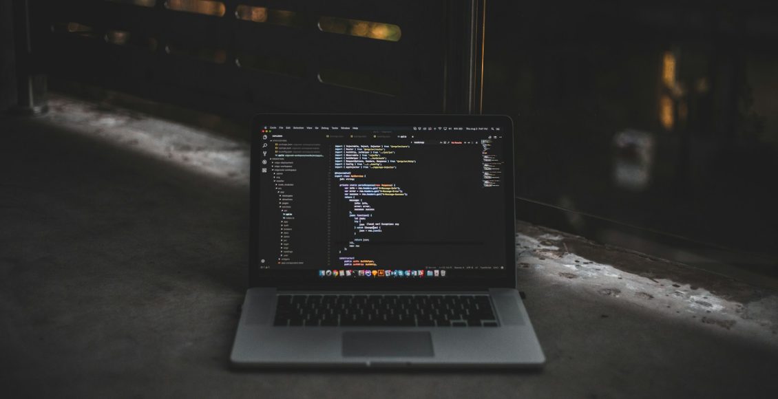 MacBook Pro inside gray room