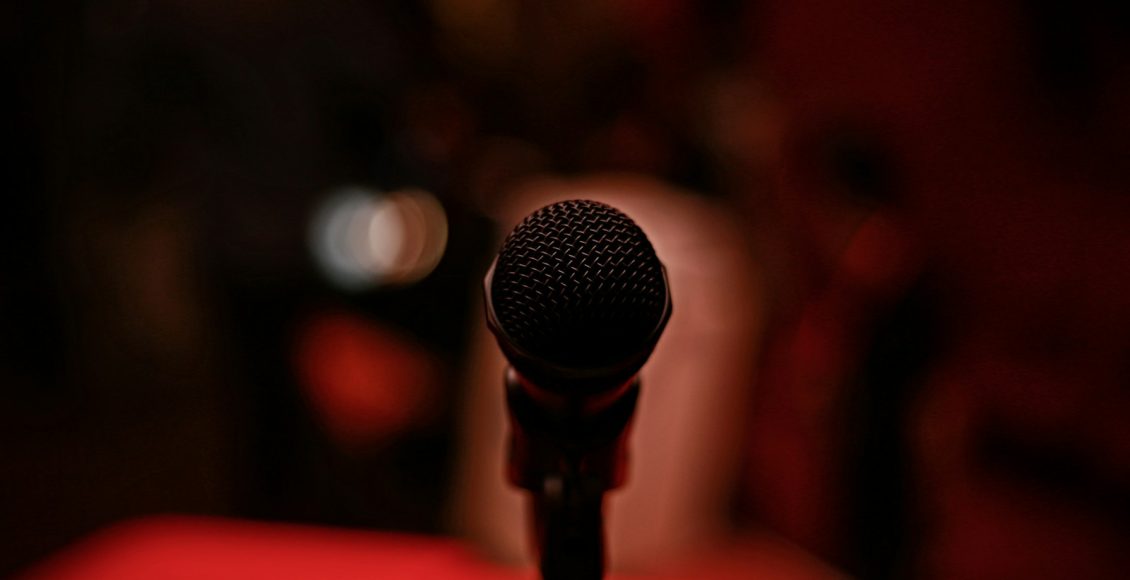 selective focus photography of black microphone